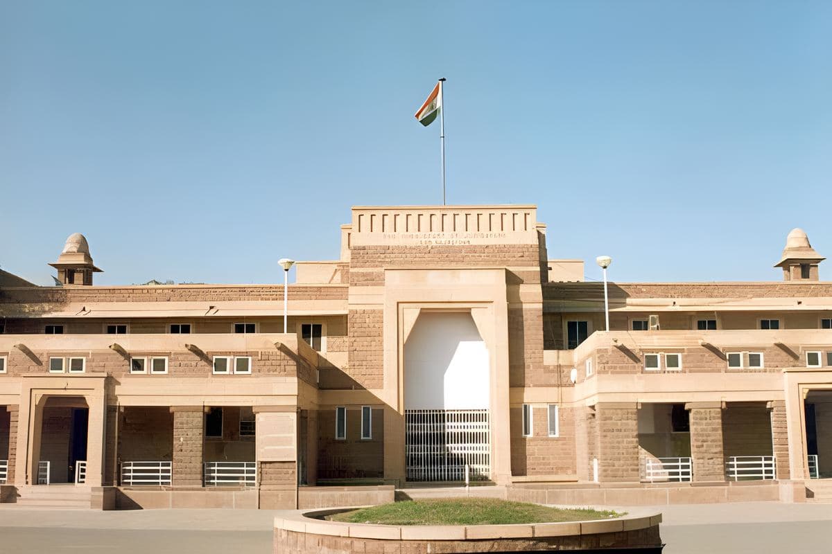 The District and Sessions Court at Jodhpur — sandstone facade with the central arch and the national flag